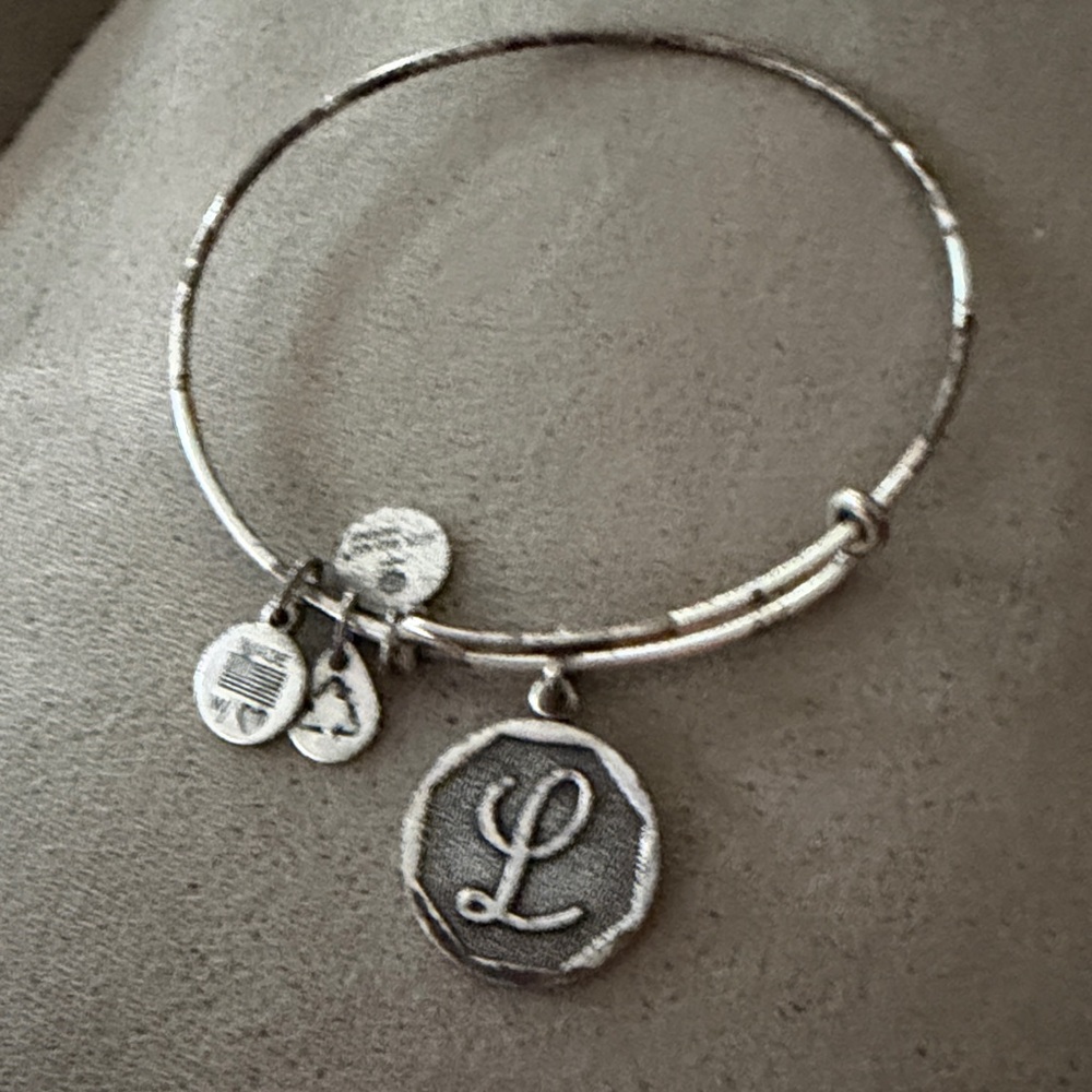 Alex and Ani Silver Charm Bracelet. Initial L need a cleaning